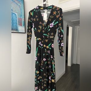New H&M dress. Long black with colorful flower print.